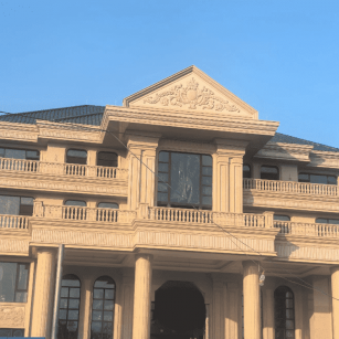 天水黄金麻别墅外墙干挂石材效果示例