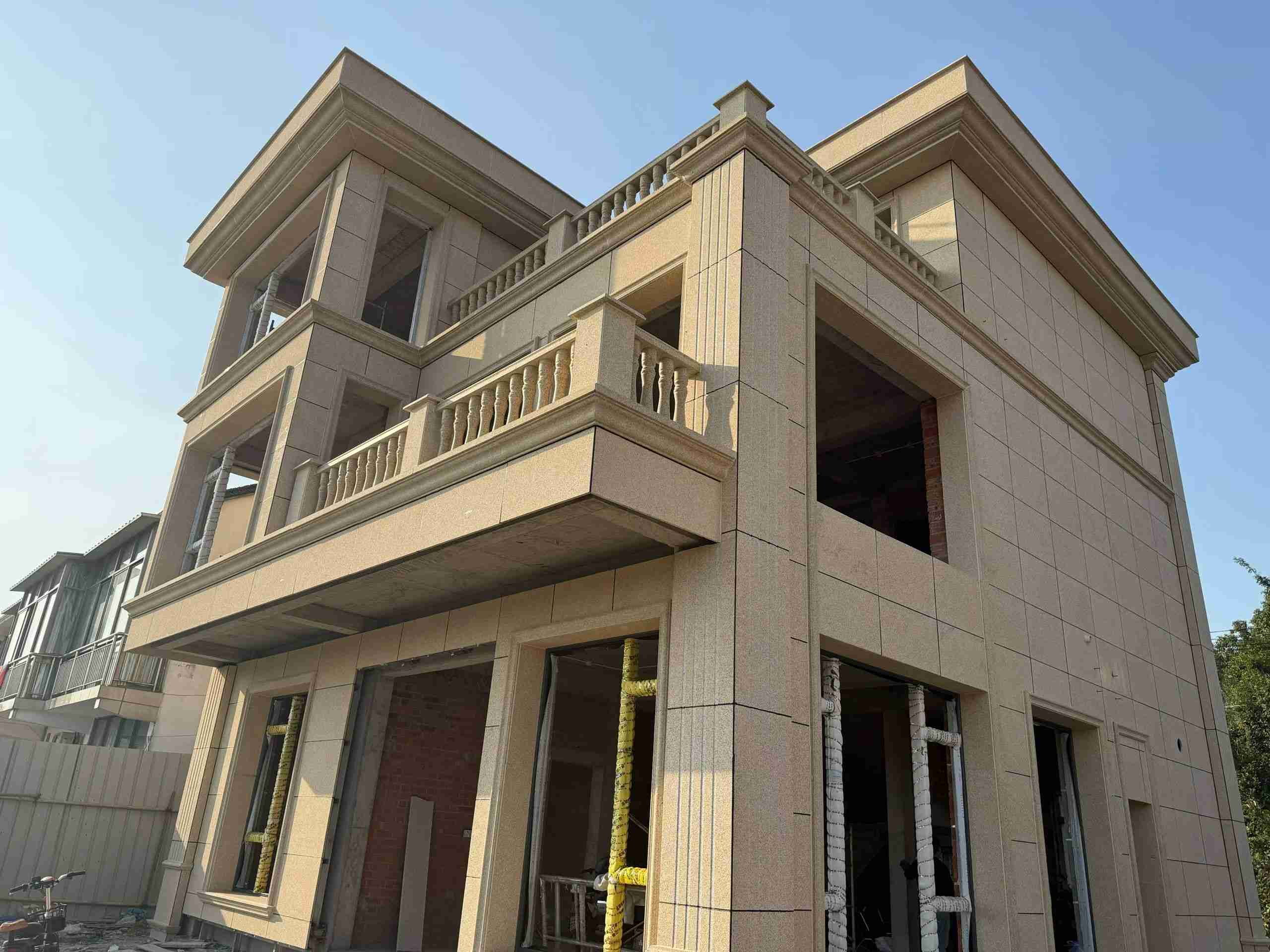 天水 黄金麻花岗岩石材荔枝面外墙干挂效果展示