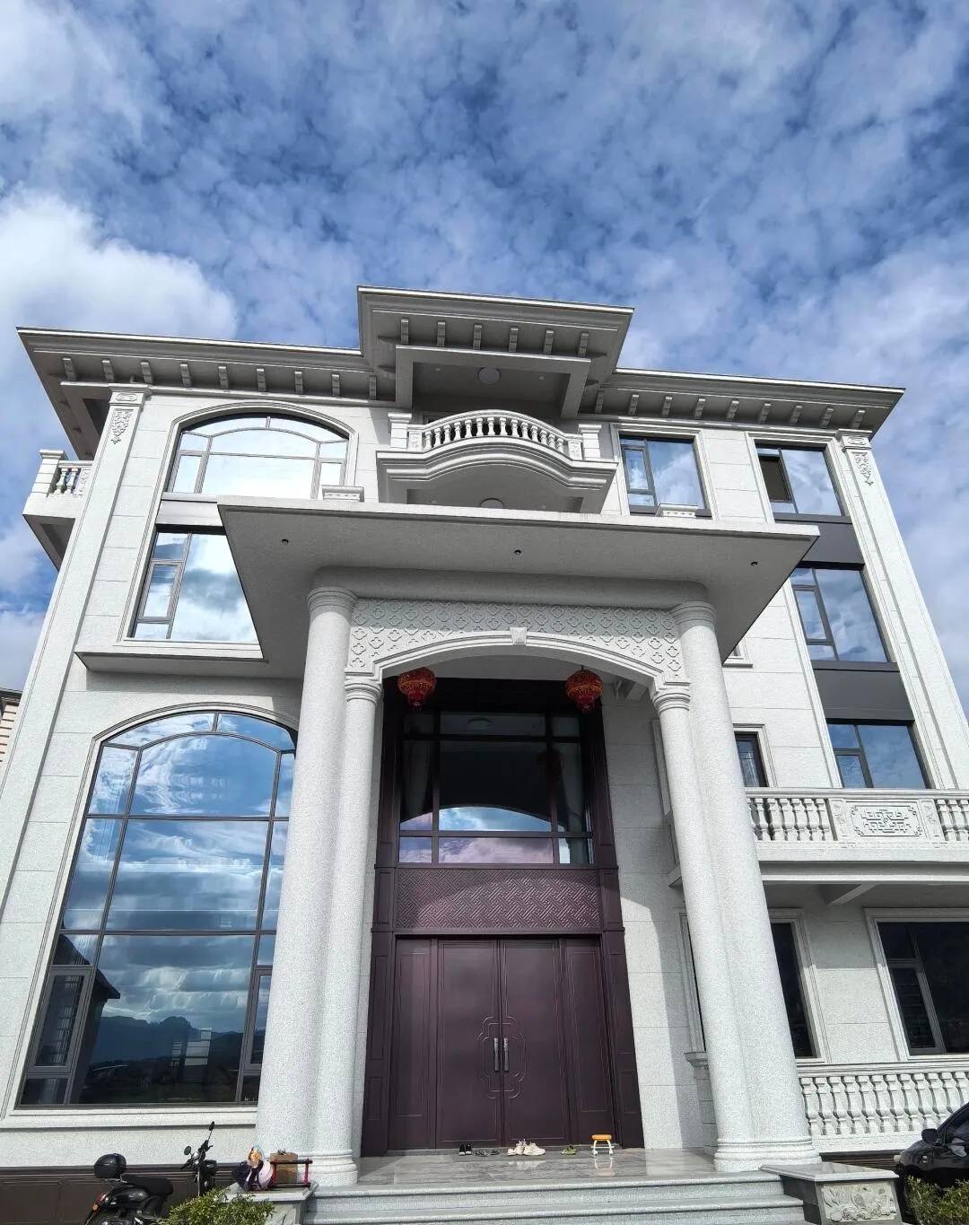 天水白麻别墅外墙干挂石材效果示例